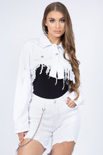 Load image into Gallery viewer, Distressed white denim jacket with frayed hem, showcased on a young female model with long brown hair