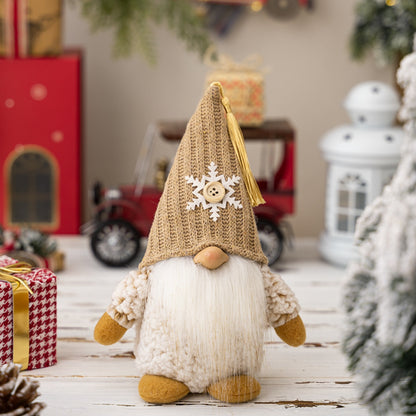 Christmas Pointed Hat Faceless Doll Ornament - Cozy knit gnome decoration with snowflake accent, surrounded by festive holiday items.