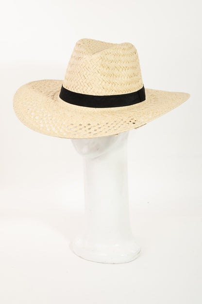 Elegant natural straw wide-brimmed sun hat with stylish black band detail, perfect for sunny days and outdoor adventures.