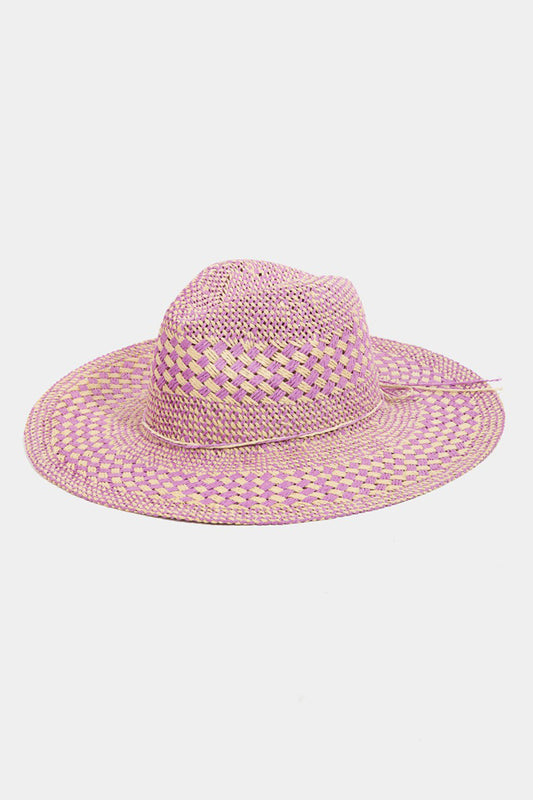 Checkered straw weave sun hat in vibrant pink and yellow hues, offering stylish sun protection.