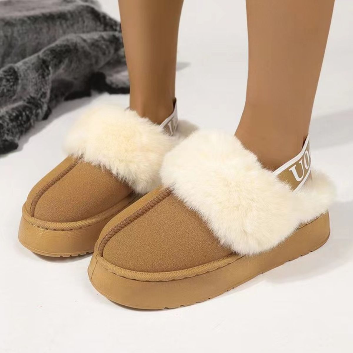 Plush suede platform slippers with soft faux fur trim and letter strap