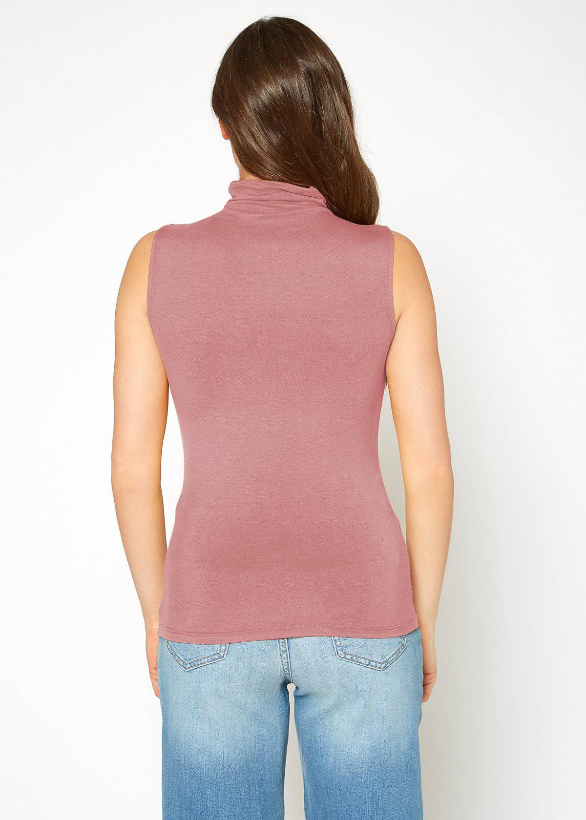 Sleeveless pink turtle neck fitted top, stylish casual wear for women.