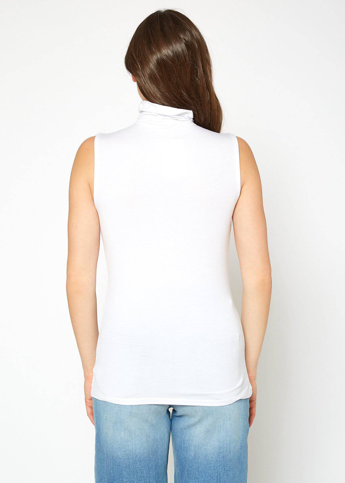 Sleeveless white turtleneck fitted top displaying a woman's long brown hair from the back.