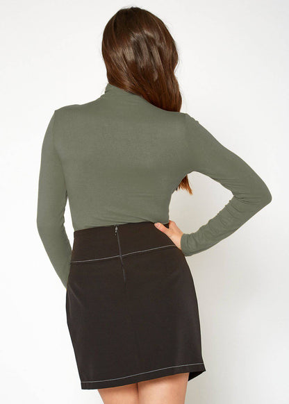 Fitted long-sleeved turtle neck top in olive green, showcased against a plain white background.