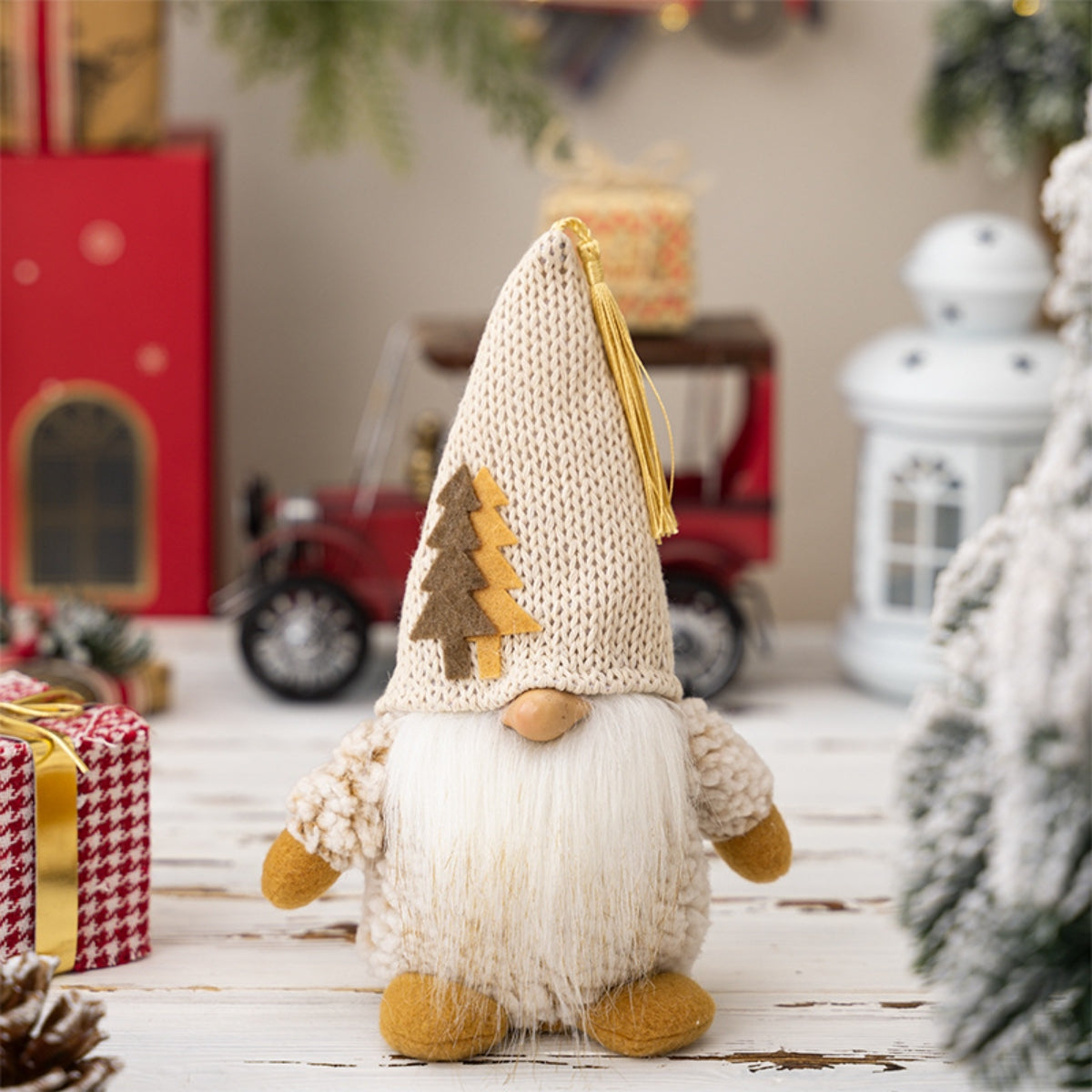 Cozy Christmas Gnome Figurine - Plush Scandinavian-style holiday home decor ornament with knit hat and faux fur body, surrounded by seasonal accents.