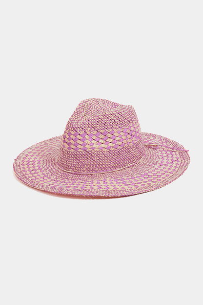 Checkered straw weave sun hat with vibrant pink and yellow pattern