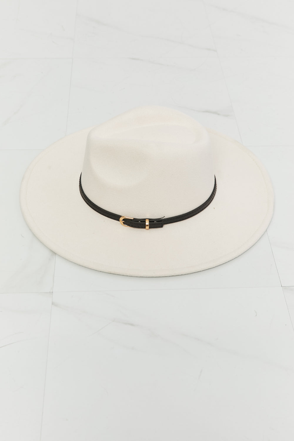 Stylish white fedora hat with black band and metal accent, perfect for any casual or formal occasion.