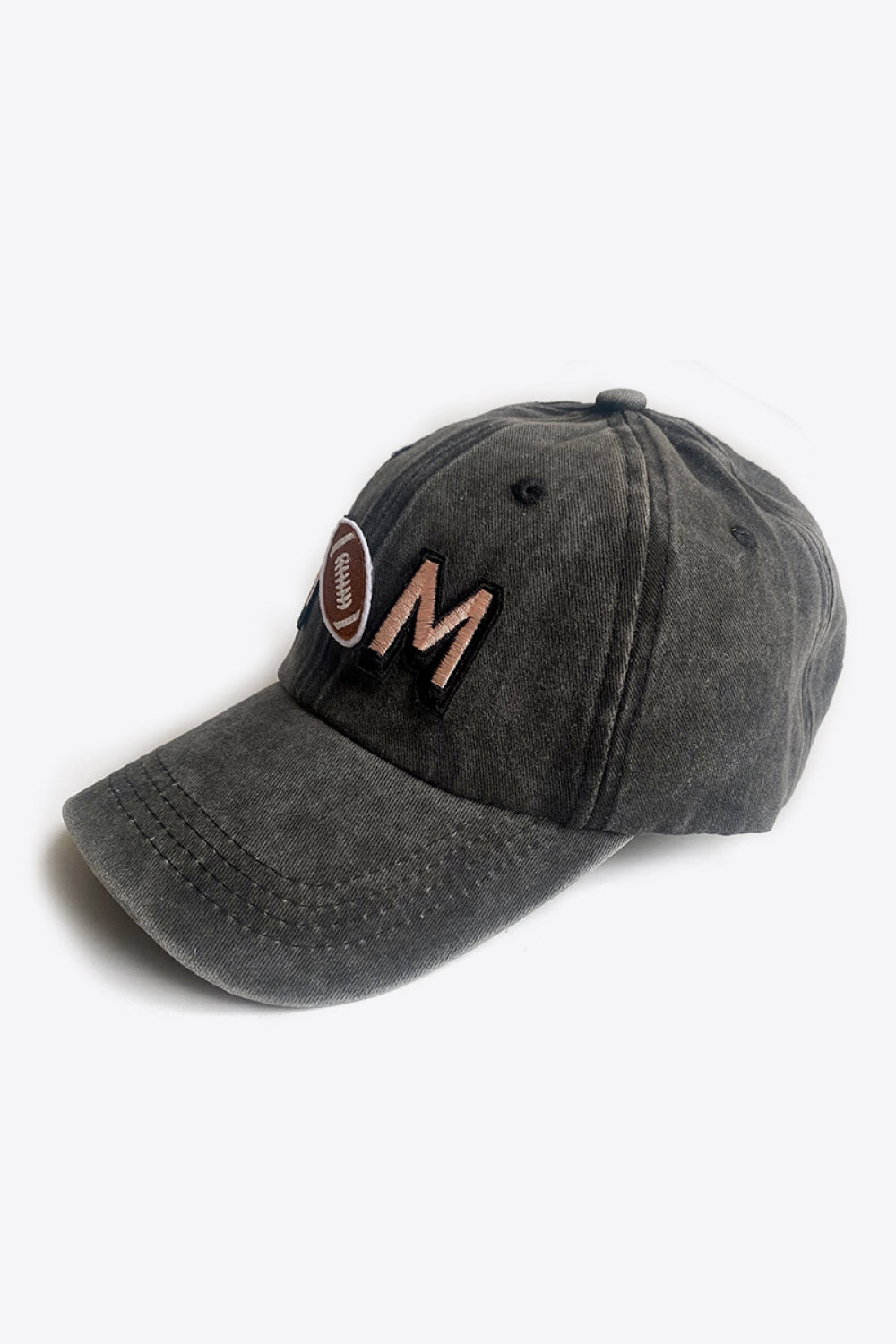 Casual mom baseball cap with distressed charcoal gray fabric and leather "MOM" logo applique.