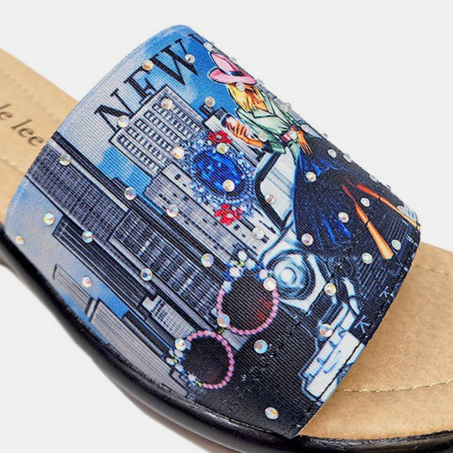 Colorful artistic slipper with New York City skyline and holiday decorations