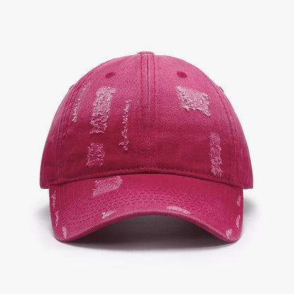 Adjustable distressed cotton baseball cap in vibrant pink color