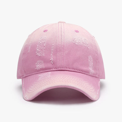 Stylish pink cotton baseball cap with subtle distressed details