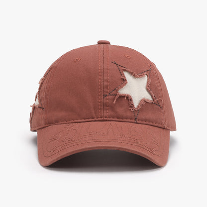 Adjustable star-embellished raw hem cap in rust-colored fabric