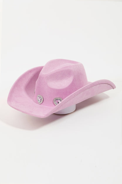 Sparkling Rhinestone-Embellished Cowgirl Hat - A vibrant pink cowboy hat adorned with dazzling rhinestone accents, perfect for adding a touch of glamour to any western-inspired ensemble.