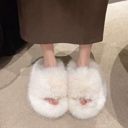 Plush white open-toe platform slippers with furry texture and soft cushioning for comfortable indoor wear.