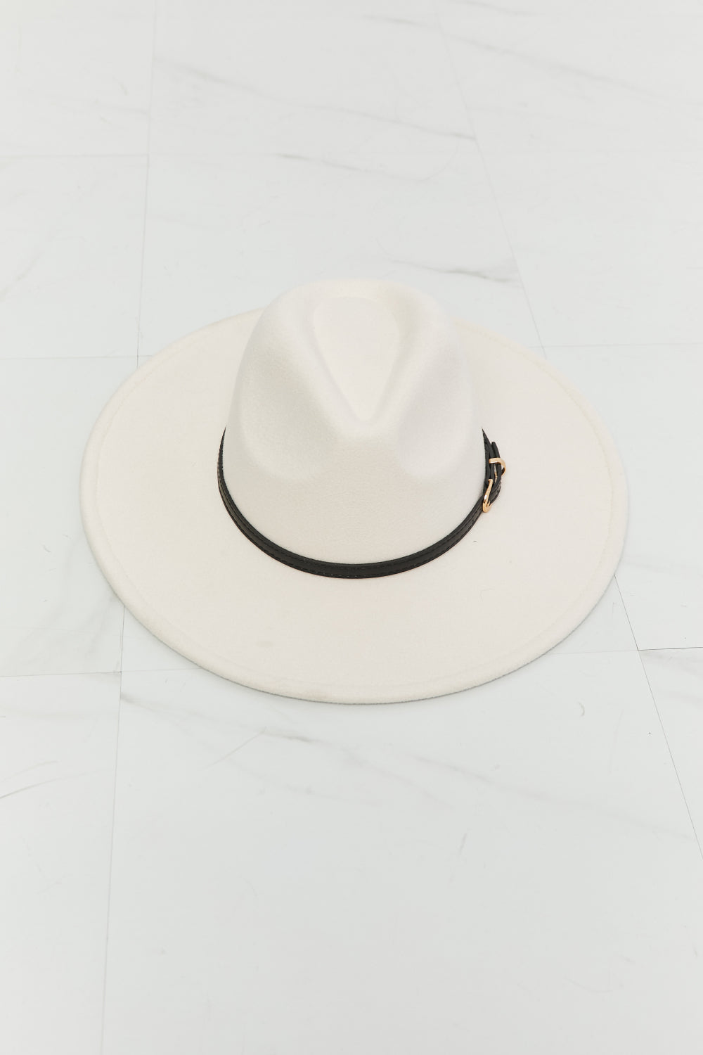 Stylish white fedora hat with black band, featured against a plain white background.