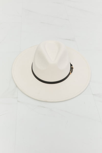 Stylish white fedora hat with black band, featured against a plain white background.