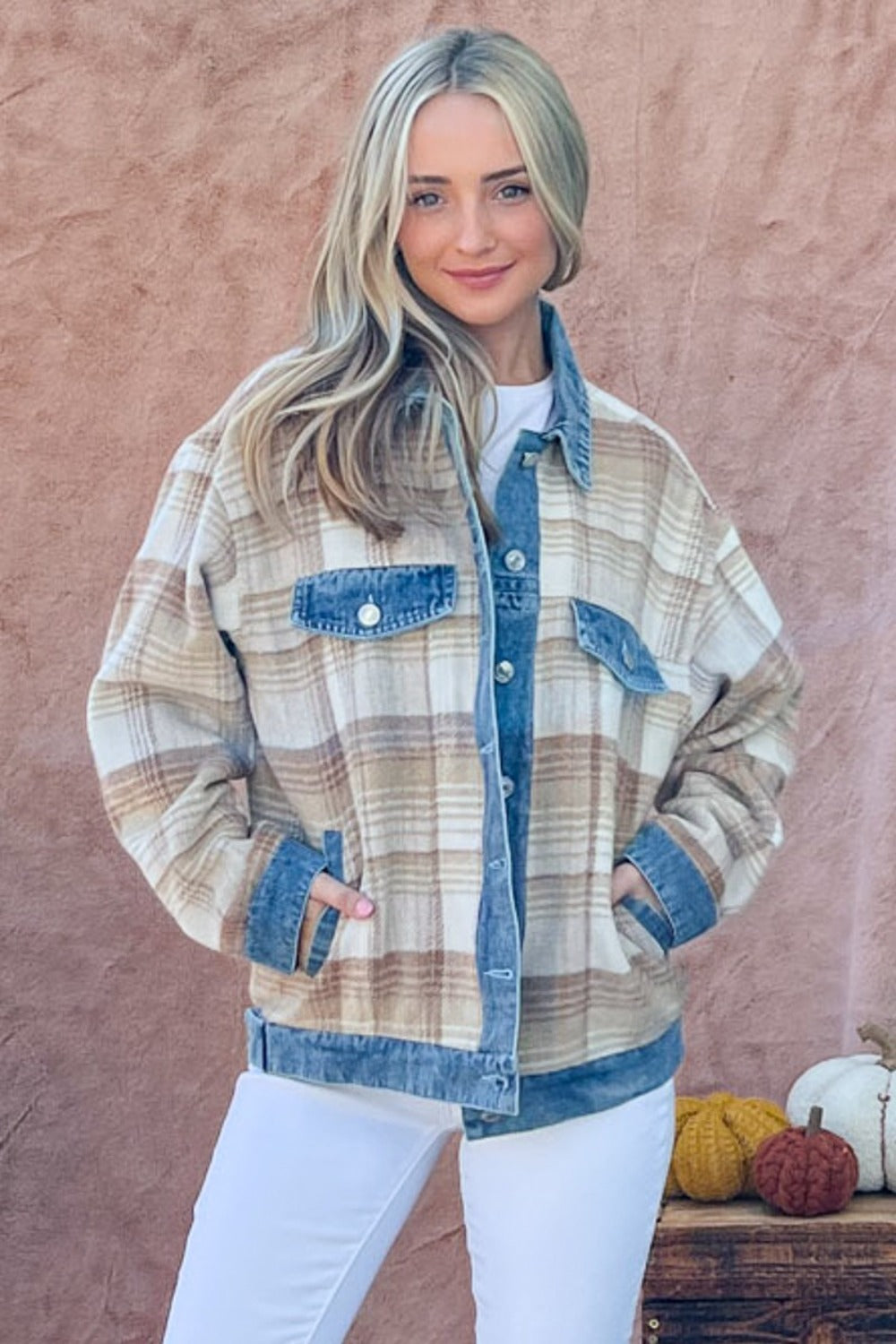 Stylish plaid jacket with denim accents. Cozy brushed finish and full-size design for versatile wear. Fashionable casual look.