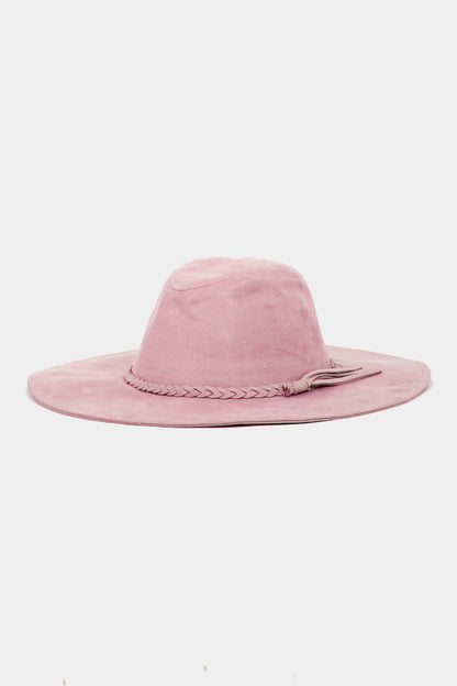 Fashionable faux suede hat with braided detail, stylish accessory for the modern woman.