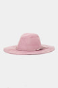 Fashionable faux suede hat with braided detail, stylish accessory for the modern woman.