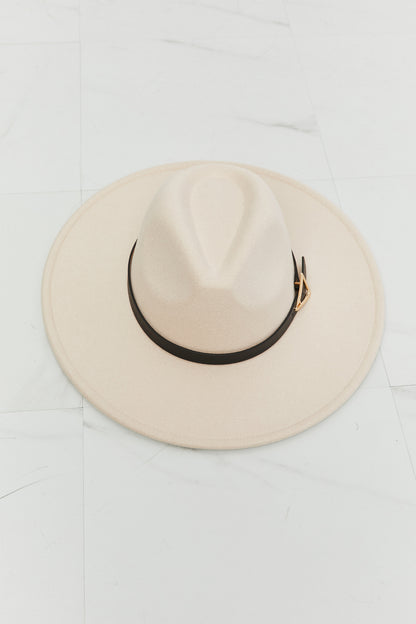 Stylish white fedora hat with leather band displayed against a plain background.