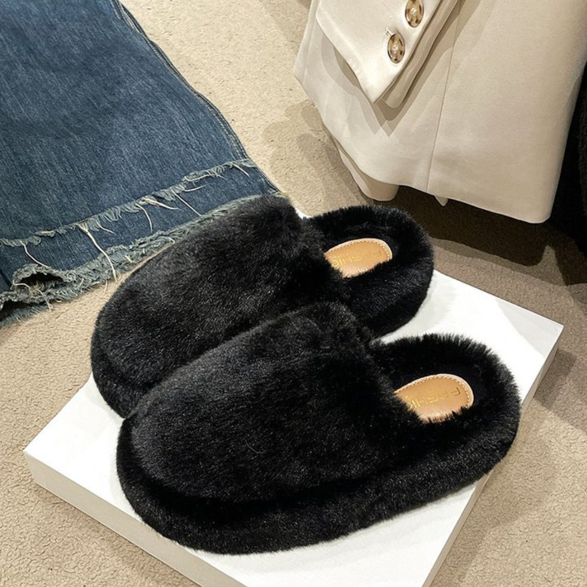 Soft, Plush Black Fuzzy Slippers on White Floor