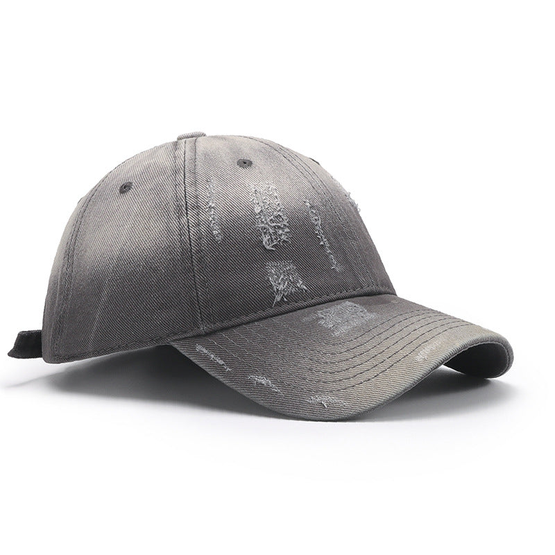 Adjustable distressed cotton baseball hat in a stylish grey color.