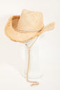 Stylish straw cowboy hat with adjustable strap and raw edge detailing, perfect accessory for casual summer outfits.