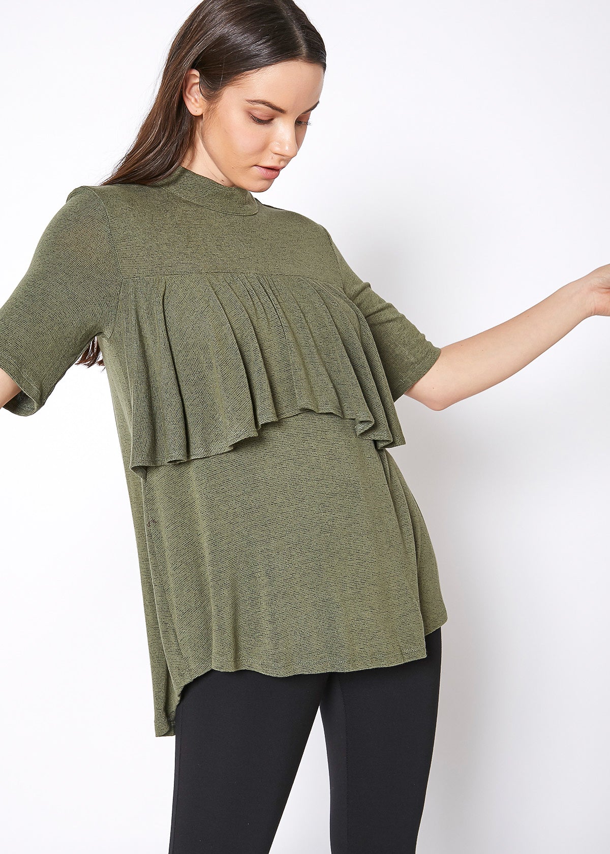 Olive-green mock neck top with ruffled yoke, perfect for casual chic style.