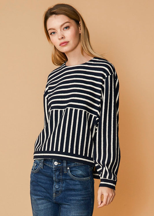 Striped dolman sweatshirt in midnight blue and white, featuring a relaxed, oversized silhouette for a comfortable, stylish look.