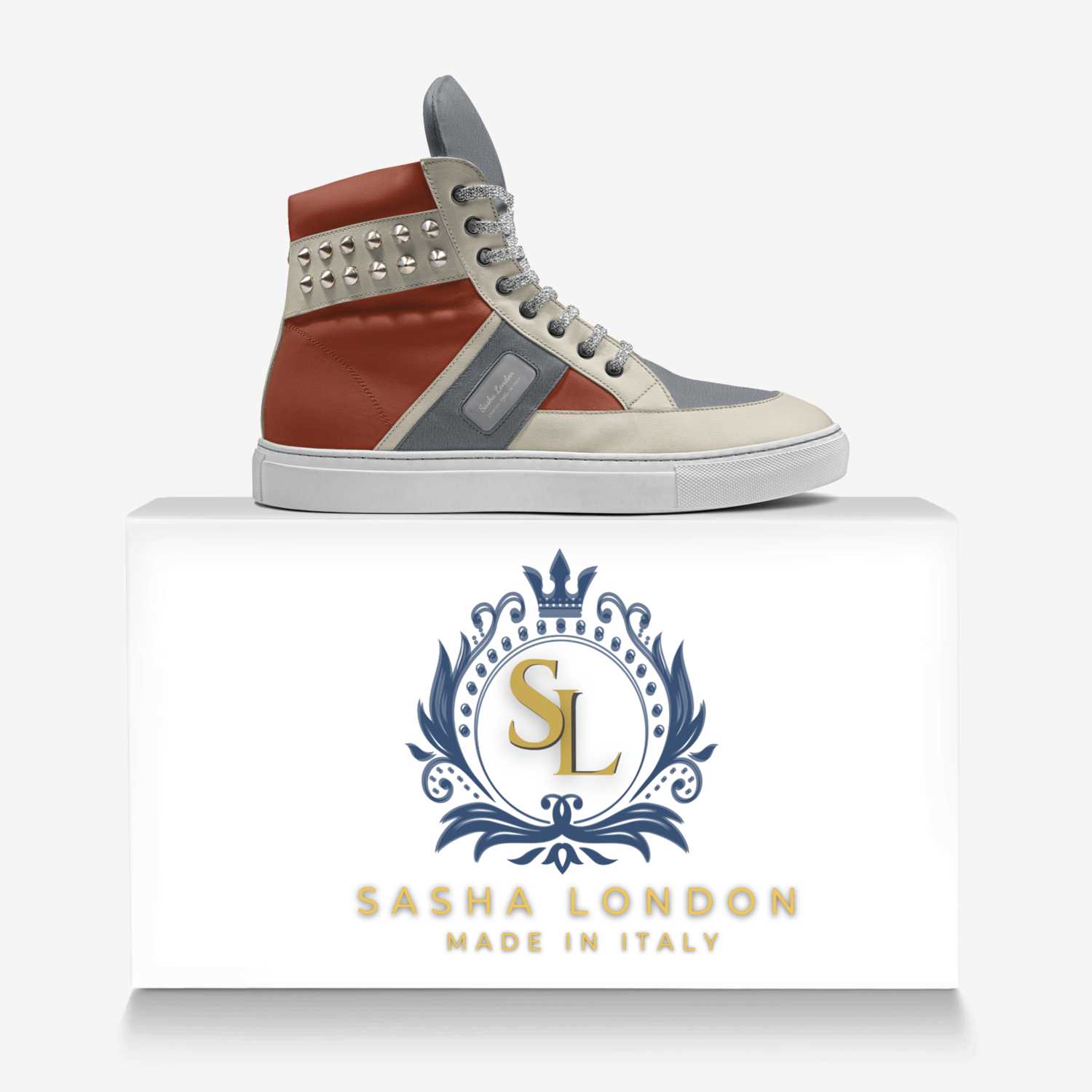 Stylish Sasha London sneakers with studded leather accent, showcased on a plain white background with the brand logo prominently displayed.