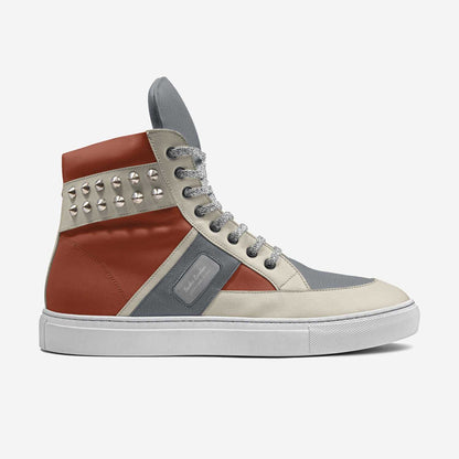 Stylish high-top sneakers featuring a studded leather upper, contrasting colors, and a sleek silhouette.