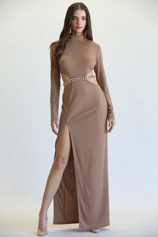 Elegant ribbed maxi dress with high-neck and thigh-high slit, worn by a young woman with long brown hair against a plain white background.