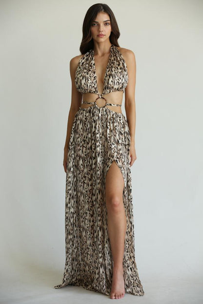 Elegant cheetah-print maxi dress with plunging neckline and thigh-high slit, perfect for a glamorous evening look.