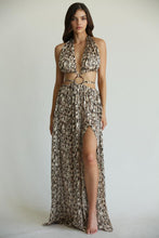 Load image into Gallery viewer, Elegant cheetah-print maxi dress with plunging neckline and thigh-high slit, perfect for a glamorous evening look.