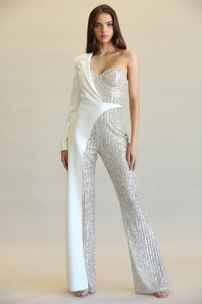 Sequin and Solid Woven Jumpsuit
Sleek, one-shoulder jumpsuit with shimmering sequin panels and solid woven fabric for a chic, eye-catching look.