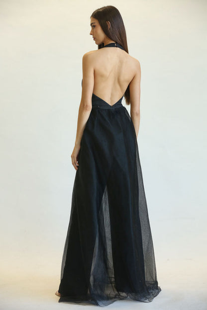 Elegant halter neckline jumpsuit in sleek black, dramatic open back design.