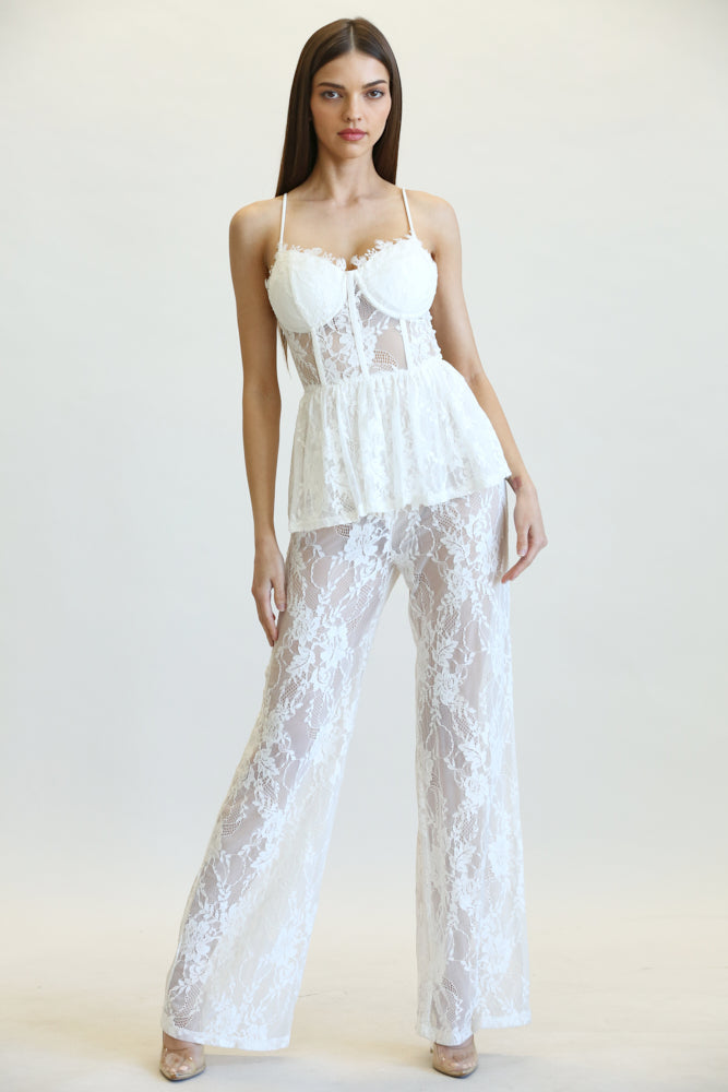 Elegant white lace jumpsuit with peplum waist and halter neckline