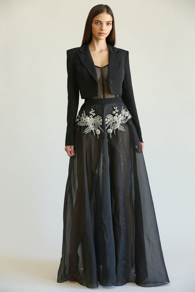 Elegant black dress and blazer set with intricate floral embroidery, showcasing a high-fashion, formal style.