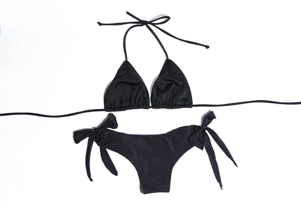 Black triangle bikini top with tie-side bottoms featuring bow details