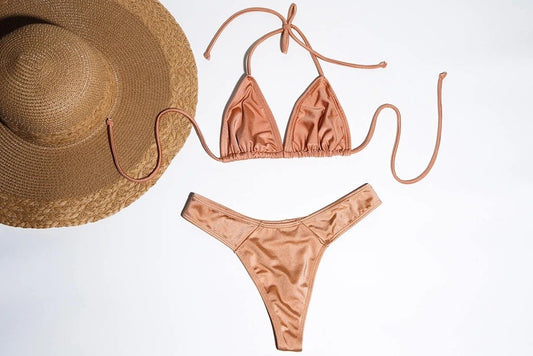 Luxury peach bikini set with straw hat, elegant designer swimwear for stylish beach vacation