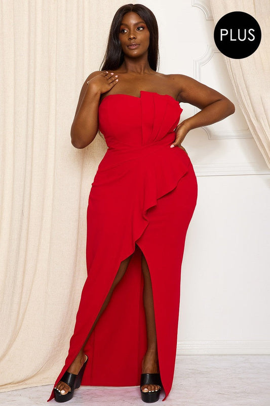 Elegant red strapless maxi dress with pleated details and high slit, perfect for a formal occasion.