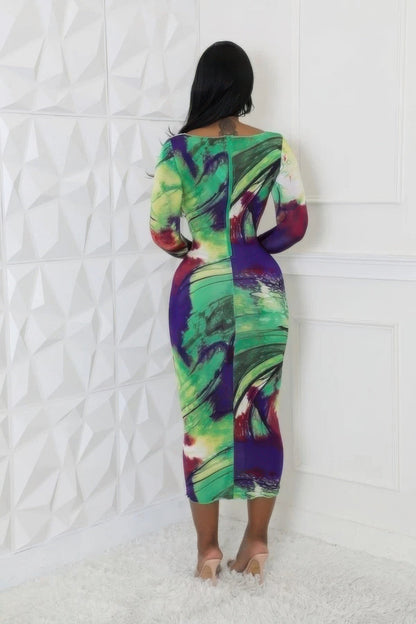 Vibrant abstract pattern dress with round neckline, long sleeves, and midi length for a stylish and comfortable look.