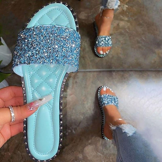 Sparkling crystal-embellished mint green women's slippers with bling bling flats for the beach or casual summer wear.