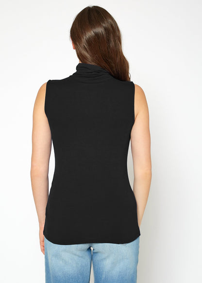 Women's black sleeveless turtle neck fitted top with smooth, flowing fabric.