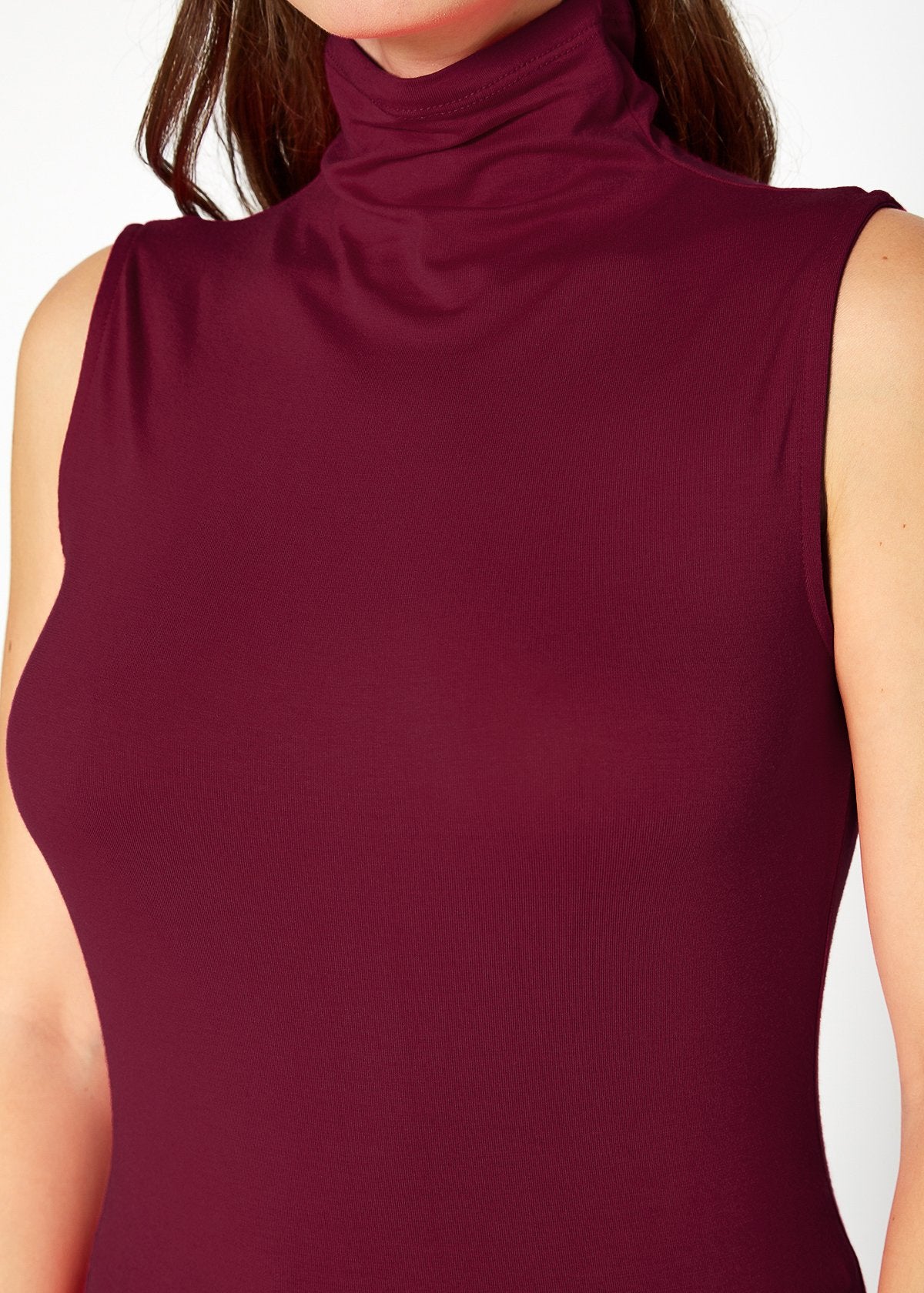 Burgundy sleeveless turtleneck fitted top on white background