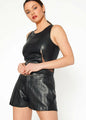 Sleeveless mesh and PU leather top in black, fashionable outfit with leather shorts