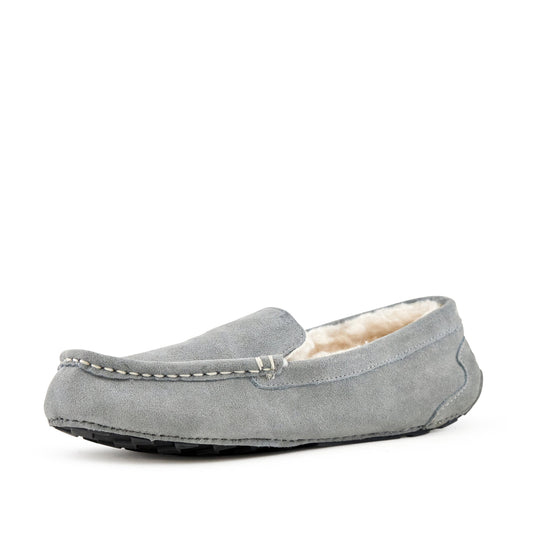 Warm, cozy women's slippers in light grey suede with plush lining, perfect for relaxing indoor comfort.