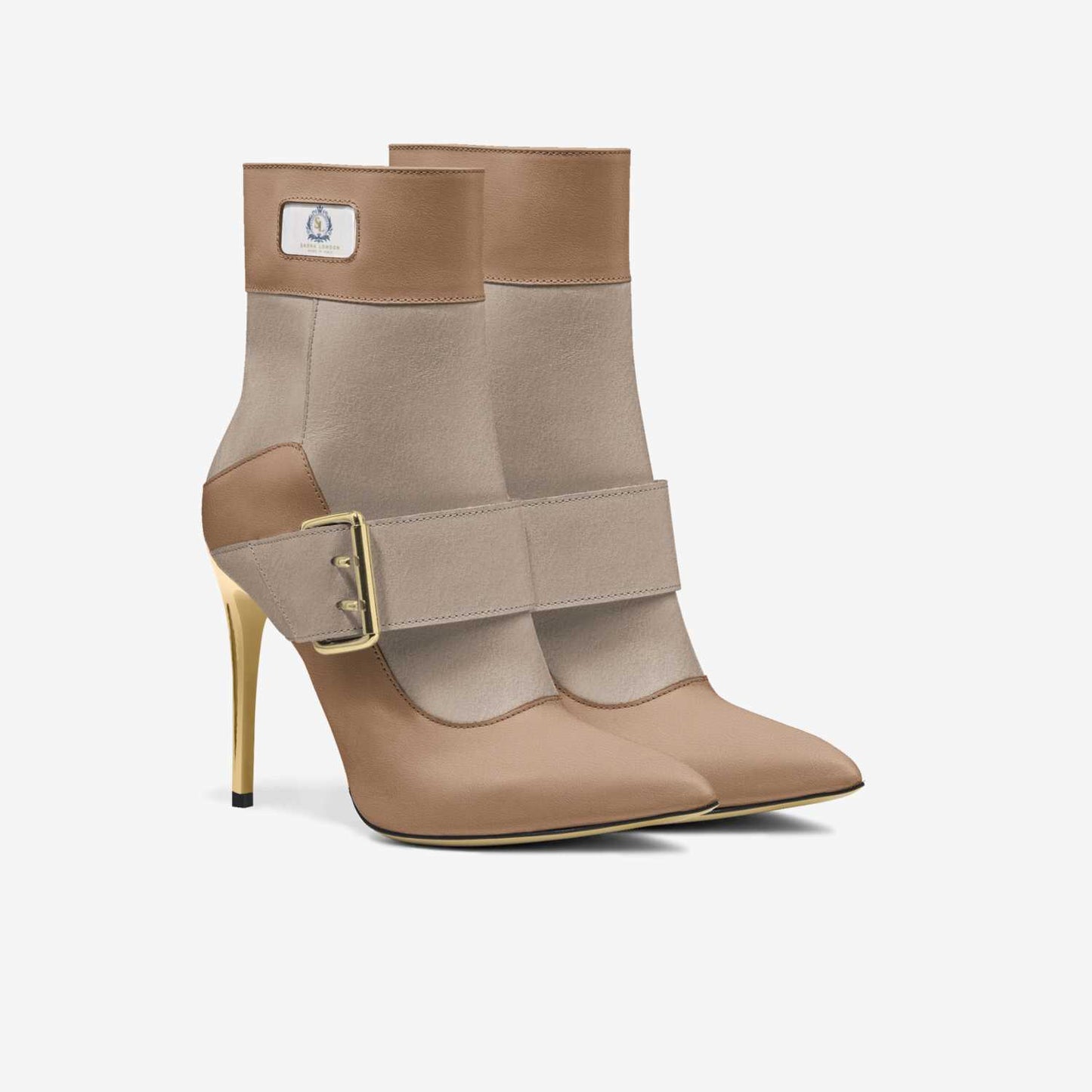 Elegant nude ankle boots with stiletto heel and adjustable buckle strap, showcasing a chic and sophisticated style.