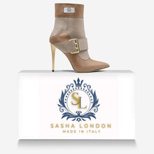 Load image into Gallery viewer, The Tawny Ankle Boot by Sasha London
Fashionable beige leather ankle boot with golden details, buckle accent, and pointed toe style