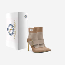 Load image into Gallery viewer, Elegant beige ankle boots with a stylish buckle detail, resting on a white background with decorative packaging.